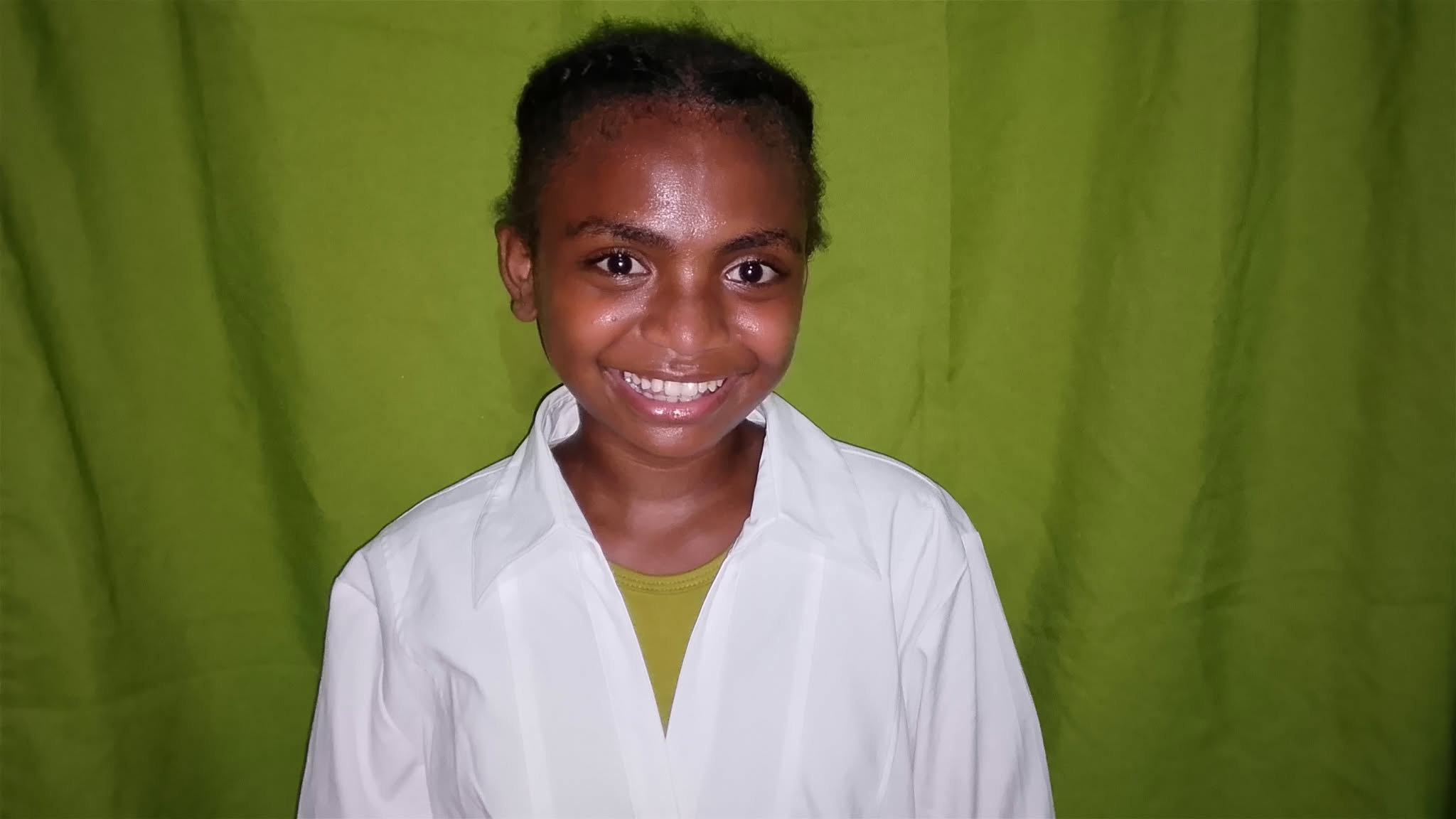 A scholar supported by the Aeta scholarship drive.
